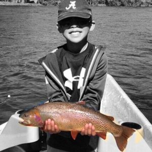 Young Angler with Cutthroat Trout