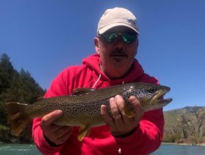 fishing guide dan dellacato with brown trout