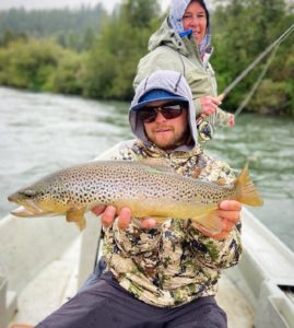 Chase Hines with south fork brown trout