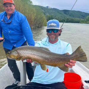 Fly Fishing Guide Scott Reimer holds a big brown trout.