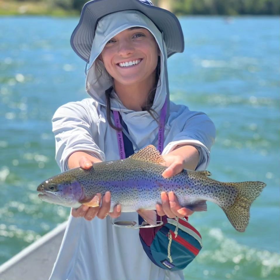 lady angler with rainbow trout