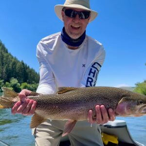 South Fork Angler with large trout. Snake river fishing report.