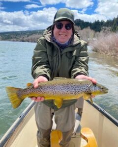 Snake River Fly Fisherman with Brown Trout