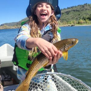 Daisy Hays with a Brown Trout on the South Fork of the Snake River