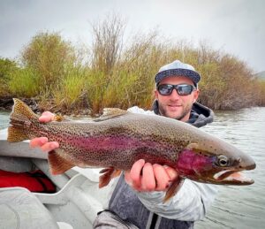 Elijah Roth with a nice Rainbow Trout on the South Fork of the Snake River