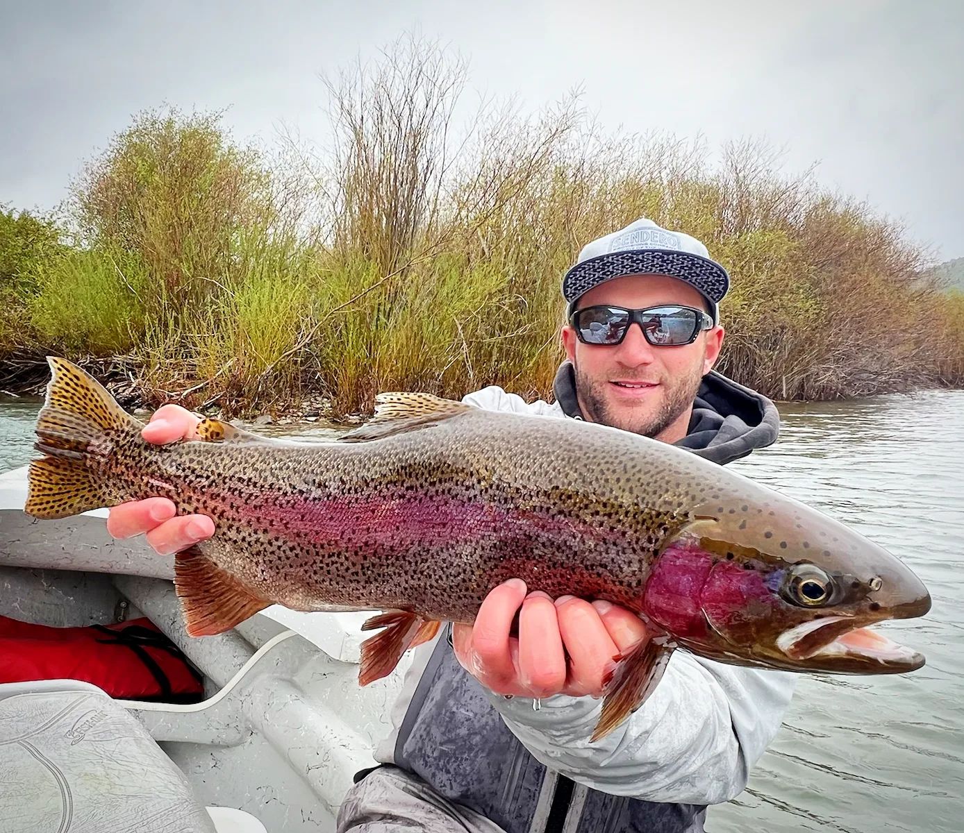 Elijah Roth with a nice Rainbow Trout on the South Fork of the Snake River
