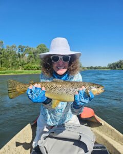 She's got a big Brown Trout.