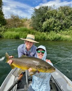 The Lodge at Palisades Creek Guide and client with a nice Brown Trout