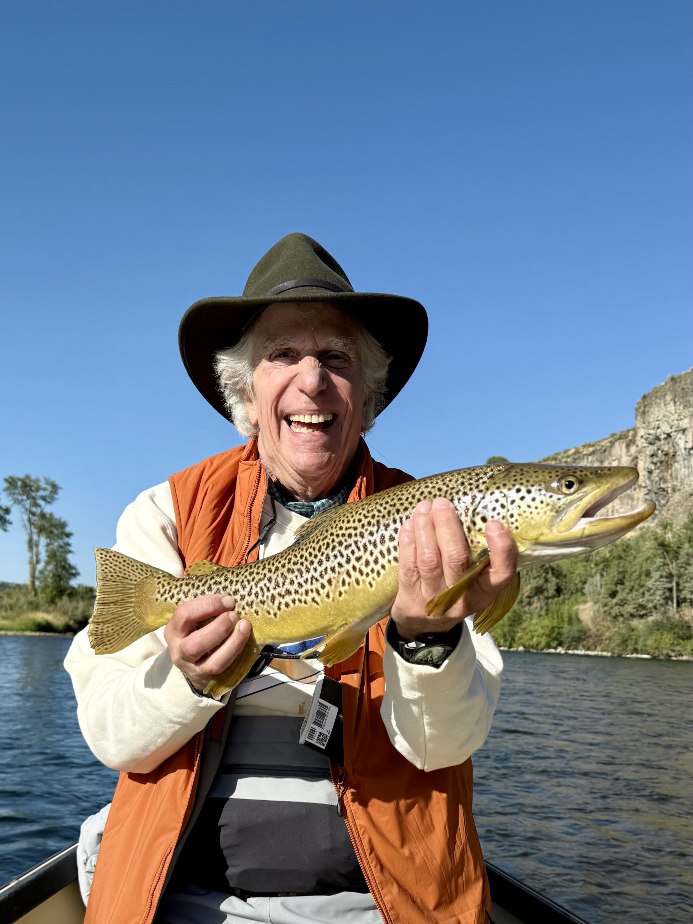 Henry Winkler fishing with The Lodge at Palisades Creek. Nice Brown Henry!