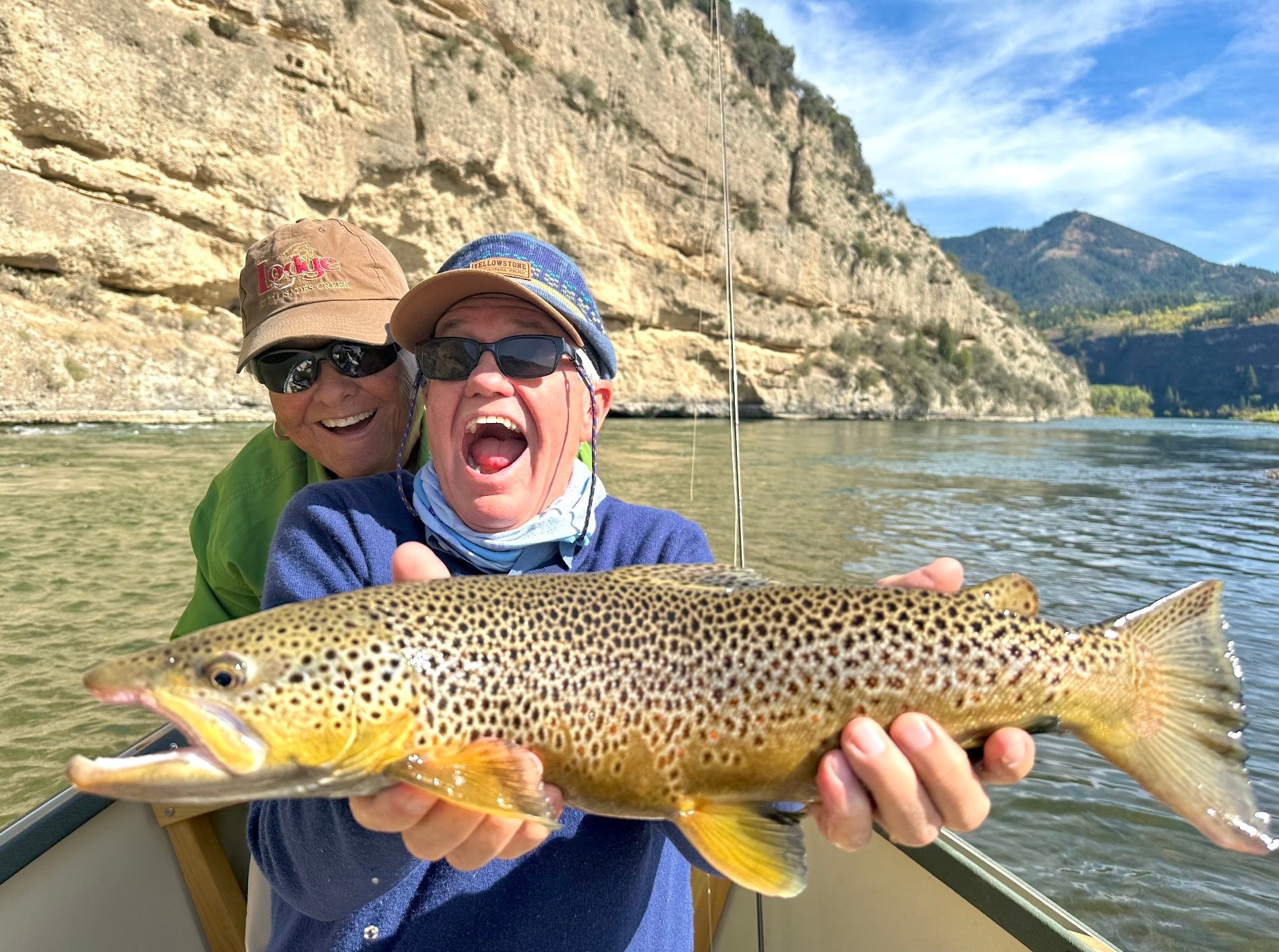 Fly Fisherman with Brown Trout on the South Fork of the Snake River